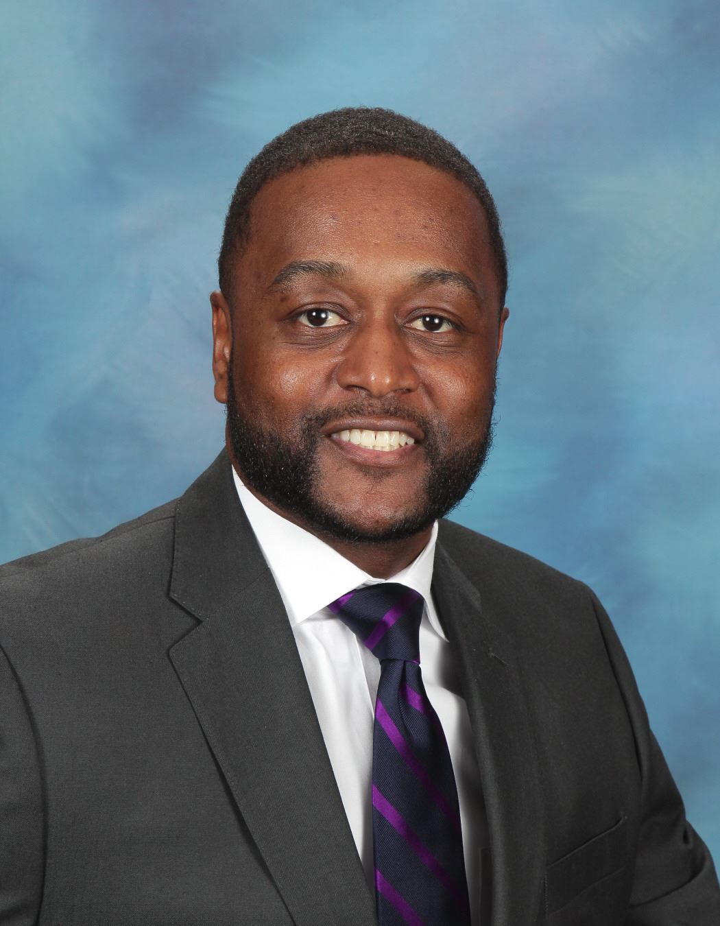 Dr. Ricardo R. Quinn, Principal