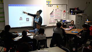  Teacher monitors students