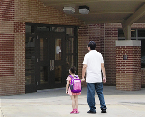 Father and student enter Lovin ES