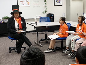 Arcado teacher speaking to a class