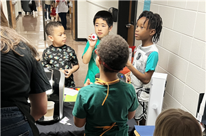 Students working with the Perky Eagle Coffee Cart