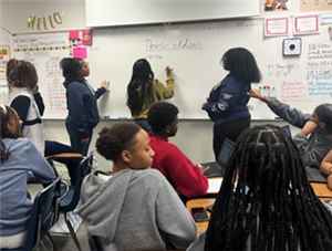 Students working on ideas for Voices of South