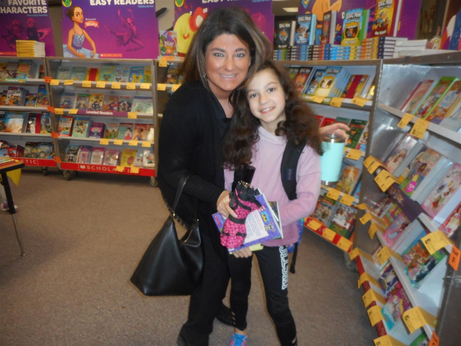 Mom and daughter at Book Fair 