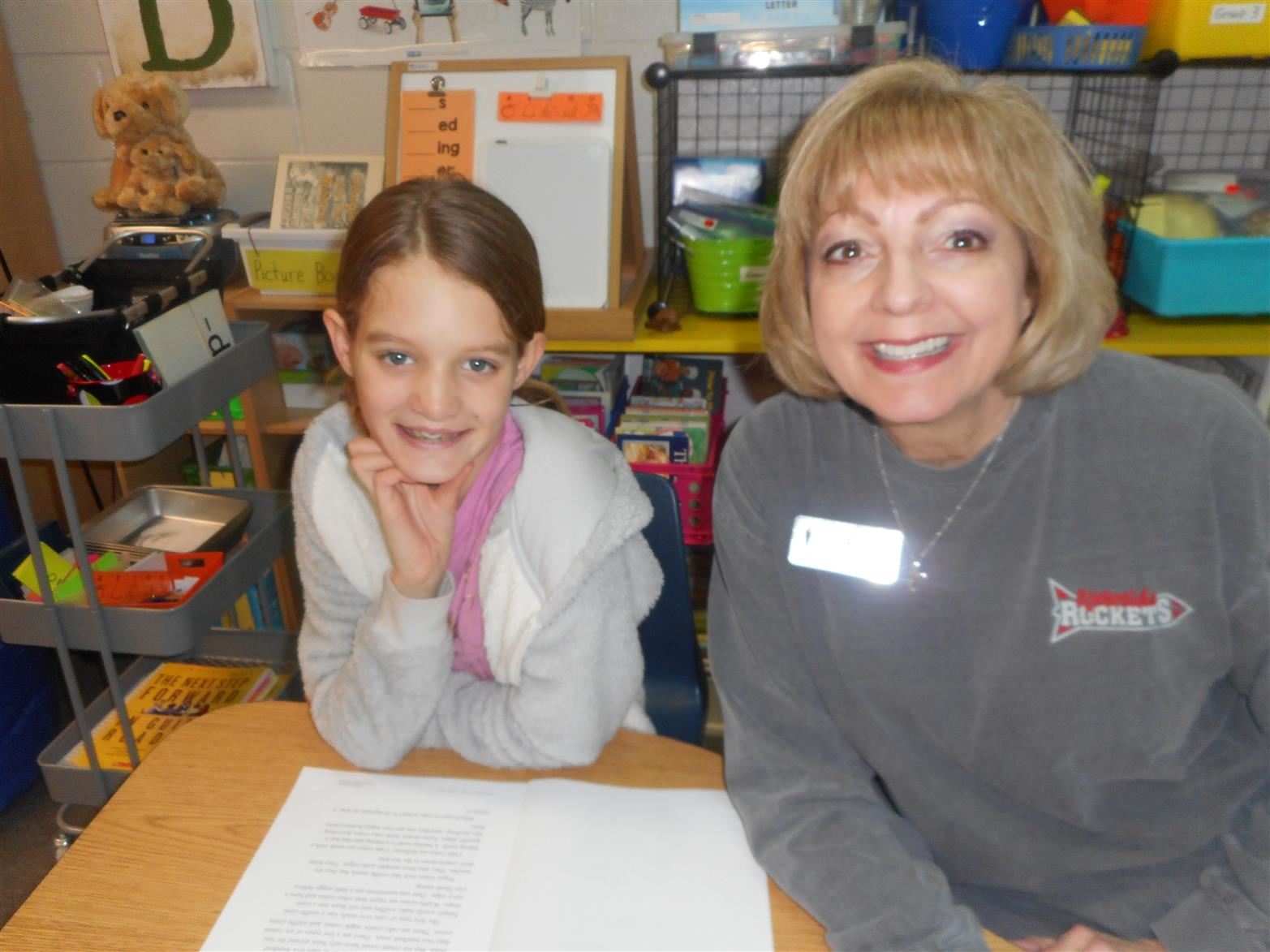 Mrs. Specht with a student Mrs. Specht with a student