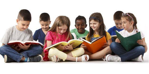 Children sitting and reading 