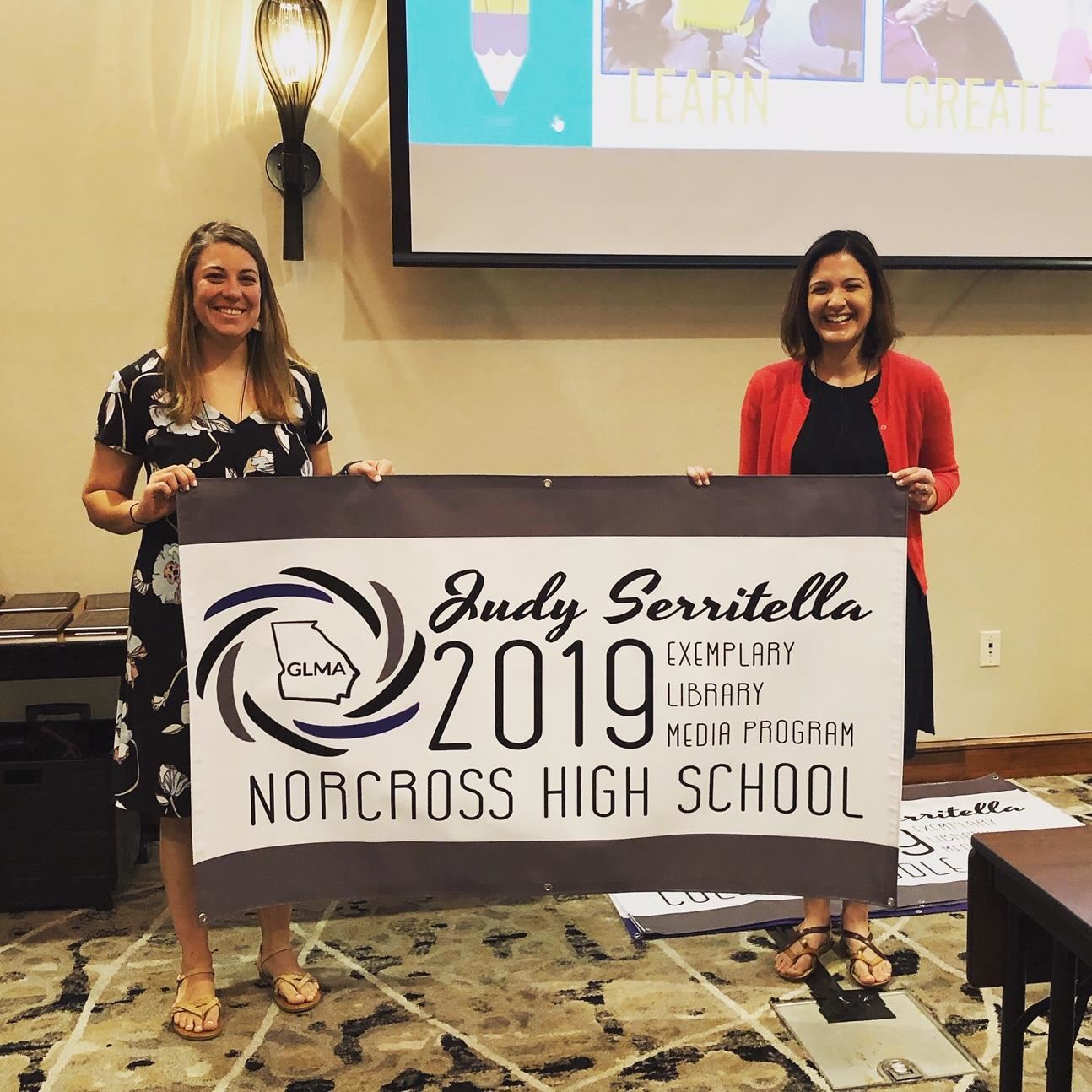 media specialists accepting award 