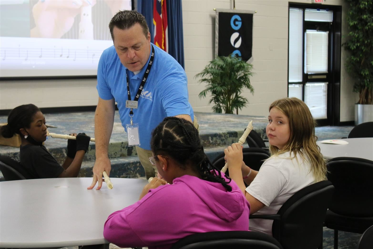 Greg working with student