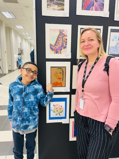Nola with student