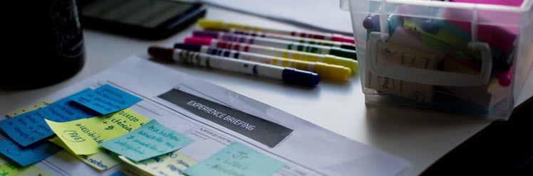 Paper and pens on a desk