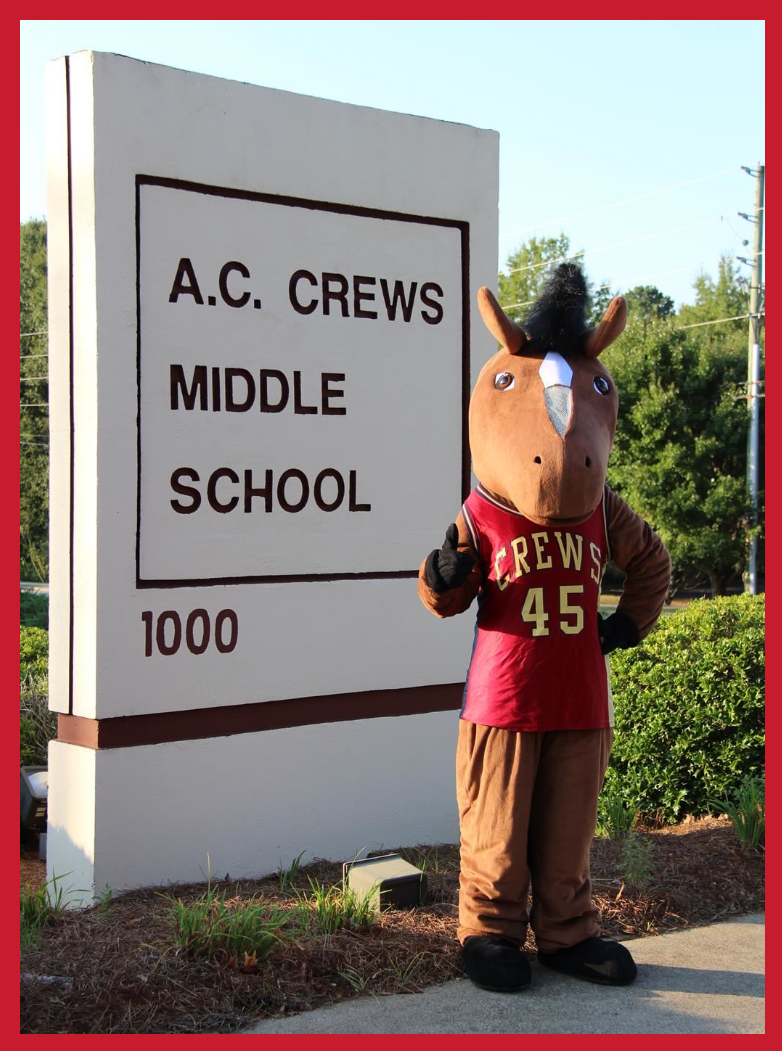Mascot with school sign