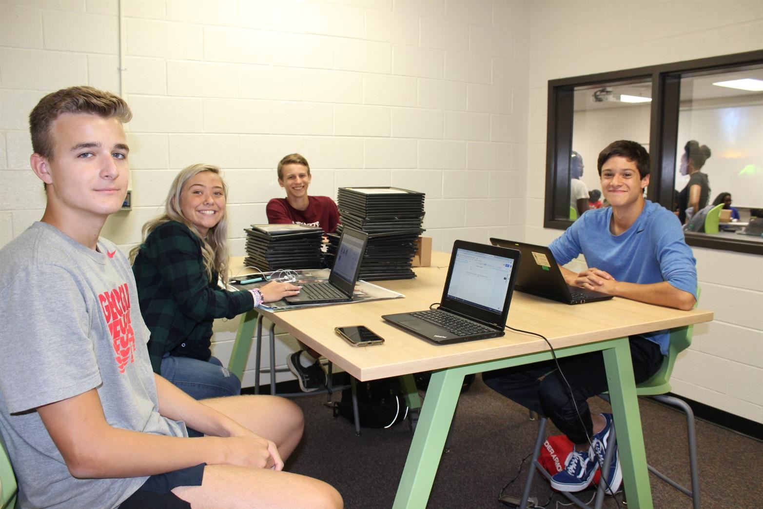 Students seated in the Entrepreneurship meeting room
